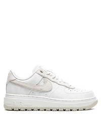 Baskets basses en cuir blanches Nike