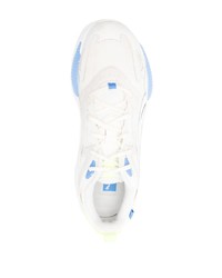 Baskets basses en cuir blanches Puma