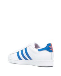 Baskets basses en cuir blanches adidas