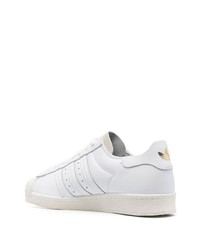 Baskets basses en cuir blanches adidas