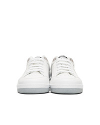 Baskets basses en cuir blanches Axel Arigato