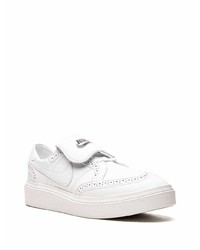 Baskets basses en cuir blanches Nike