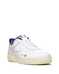 Baskets basses en cuir blanches Nike