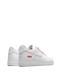 Baskets basses en cuir blanches Nike