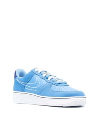 Baskets basses en cuir bleu clair Nike