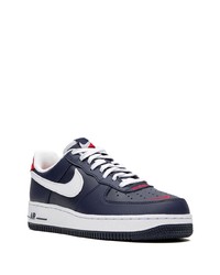 Baskets basses en cuir bleu marine et blanc Nike