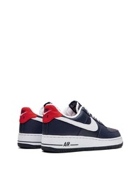 Baskets basses en cuir bleu marine et blanc Nike