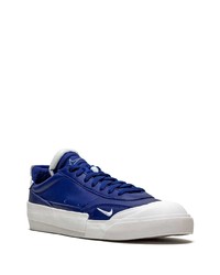 Baskets basses en cuir bleu marine et blanc Nike