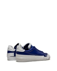 Baskets basses en cuir bleu marine et blanc Nike