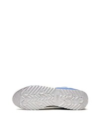 Baskets basses en cuir bleu marine et blanc Puma