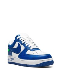Baskets basses en cuir bleu marine et blanc Nike