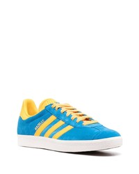 Baskets basses en cuir bleues adidas