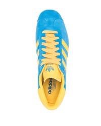 Baskets basses en cuir bleues adidas