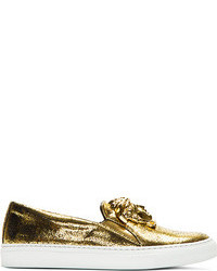 Baskets basses en cuir dorées Versace