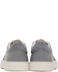 Baskets basses en cuir grises Common Projects