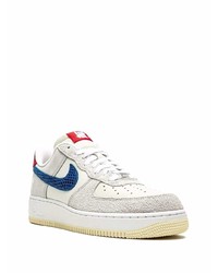 Baskets basses en cuir grises Nike