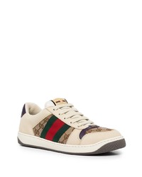 Baskets basses en cuir imprimées beiges Gucci