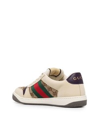 Baskets basses en cuir imprimées beiges Gucci