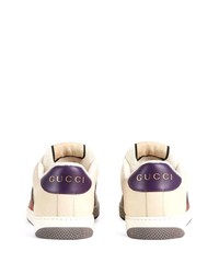 Baskets basses en cuir imprimées beiges Gucci