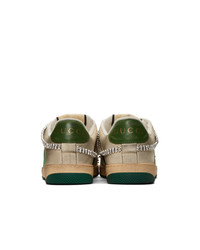 Baskets basses en cuir imprimées beiges Gucci