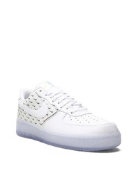 Baskets basses en cuir imprimées blanches et noires Nike