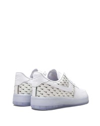 Baskets basses en cuir imprimées blanches et noires Nike