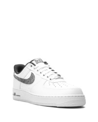 Baskets basses en cuir imprimées blanches et noires Nike