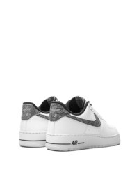 Baskets basses en cuir imprimées blanches et noires Nike