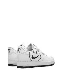 Baskets basses en cuir imprimées blanches et noires Nike