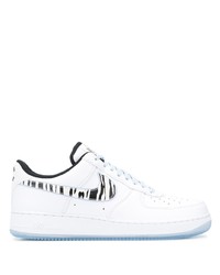 Baskets basses en cuir imprimées blanches et noires Nike