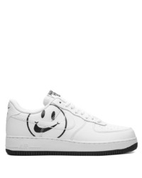 Baskets basses en cuir imprimées blanches et noires Nike