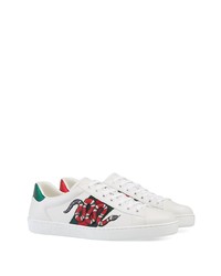 Baskets basses en cuir imprimées blanches Gucci