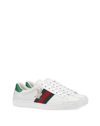 Baskets basses en cuir imprimées blanches Gucci