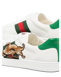 Baskets basses en cuir imprimées blanches Gucci