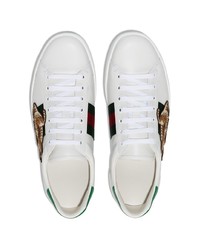 Baskets basses en cuir imprimées blanches Gucci