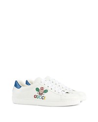 Baskets basses en cuir imprimées blanches Gucci