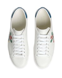 Baskets basses en cuir imprimées blanches Gucci