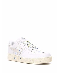 Baskets basses en cuir imprimées blanches Nike