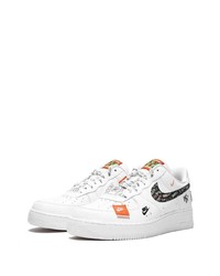 Baskets basses en cuir imprimées blanches Nike