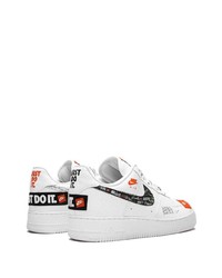 Baskets basses en cuir imprimées blanches Nike