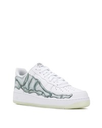 Baskets basses en cuir imprimées blanches Nike