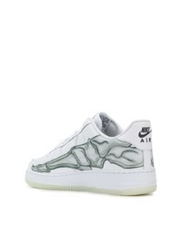 Baskets basses en cuir imprimées blanches Nike