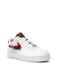 Baskets basses en cuir imprimées blanches Nike