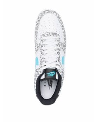 Baskets basses en cuir imprimées blanches Nike