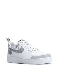 Baskets basses en cuir imprimées blanches Nike