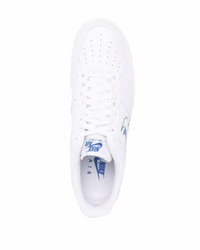 Baskets basses en cuir imprimées blanches Nike