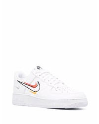 Baskets basses en cuir imprimées blanches Nike