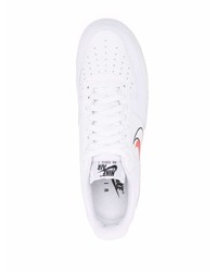 Baskets basses en cuir imprimées blanches Nike