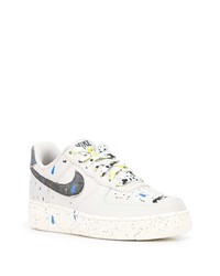 Baskets basses en cuir imprimées blanches Nike