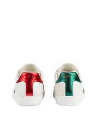 Baskets basses en cuir imprimées blanches Gucci